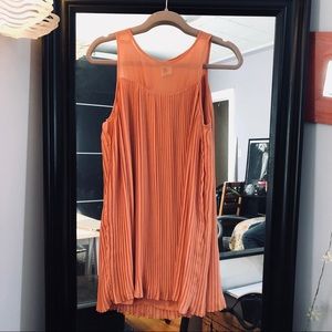 Coral pleated dress